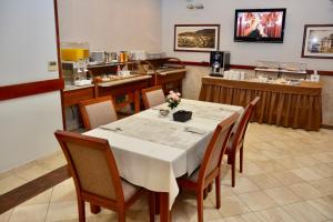 TV a/nebo společenská místnost v ubytování Hotel Stella di Mare