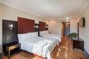Postel nebo postele na pokoji v ubytování Protea Hotel by Marriott Lusaka