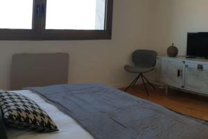 LE SOLAVUE 150 M2 VUE EXCEPTIONNELLE SUR LE LAC客房内的一张或多张床位
