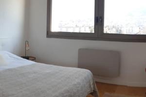 LE SOLAVUE 150 M2 VUE EXCEPTIONNELLE SUR LE LAC客房内的一张或多张床位
