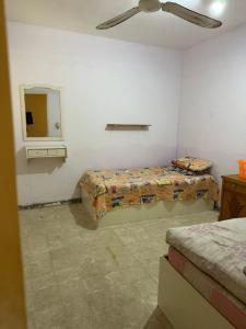 Ένα ή περισσότερα κρεβάτια σε δωμάτιο στο Chalet on casablanca north coast