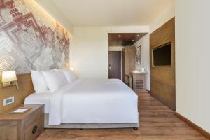 Dusit Princess Kathmandu客房内的一张或多张床位