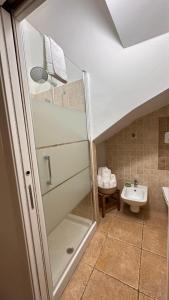 a bathroom with a shower and a sink at Dimora la Motta in Modugno