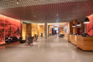 a lobby with a reception desk and a lobby at Hotel Indigo Denver Downtown - Union Station, an IHG Hotel in Denver