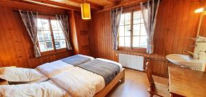 Letto o letti in una camera di Auberge le Mont-Gelé