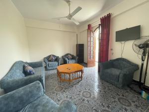 TV a/nebo společenská místnost v ubytování Gîte Hôtel Ramla Louxor