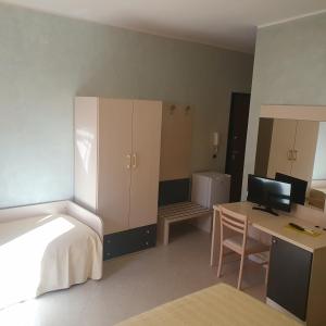 Postel nebo postele na pokoji v ubytování Hotel Ristorante Rinelli