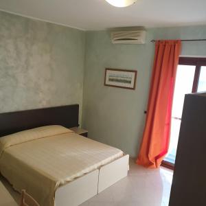 Postel nebo postele na pokoji v ubytování Hotel Ristorante Rinelli