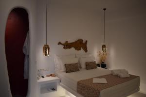 Postel nebo postele na pokoji v ubytování Angels Pillow Luxury Boutique Residence - Adults Only