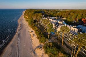 an aerial view of a beach and the ocean at Apartament Holiday Mini On The Cliff in Rewal