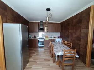 A kitchen or kitchenette at Kamara Guest House
