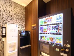 a drink vending machine in a hotel room at APA Hotel Shizuoka-eki Kita in Shizuoka