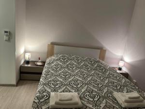 Uma cama ou camas num quarto em Valgemaja Majutus