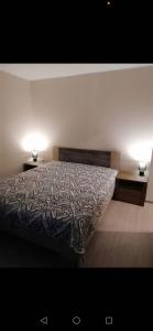 Uma cama ou camas num quarto em Valgemaja Majutus