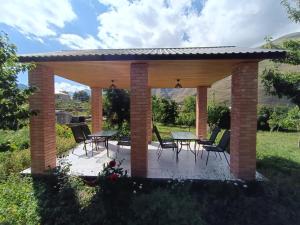 A garden outside Kamara Guest House