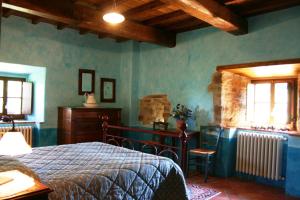 Letto o letti in una camera di Torre Di Vignale