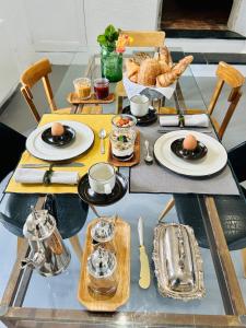 a table with eggs and bread on top of it at La Vieille Bouverie in Savennières +36 photos