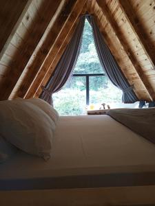 Postel nebo postele na pokoji v ubytování Villa Rıhtım Bungalov