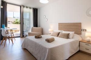 Ένα ή περισσότερα κρεβάτια σε δωμάτιο στο Casa Lilia +21 φωτογραφίες