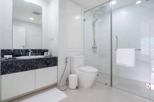 a bathroom with a toilet and a sink and a shower at Patong Tower Brand New 1-Bedroom , Near Beach in Patong Beach +29 photos