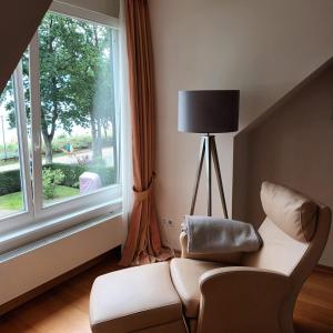 Posezení v ubytování Dünenhaus