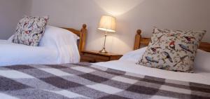 Letto o letti in una camera di Poolewe Hotel
