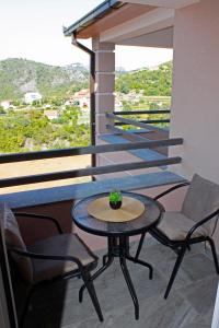En balkong eller terrasse på Sunny Side Apartments