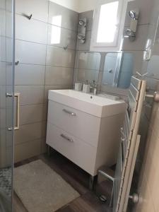 Koupelna v ubytování F2 tout confort avec vue panoramique