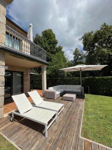 Κήπος έξω από το Casa en Sanxenxo con pisicina privada