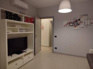 TV a/nebo společenská místnost v ubytování Relax in villa nella verde Tuscia