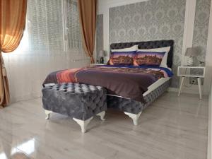 Giường trong phòng chung tại Apartman Star LUX