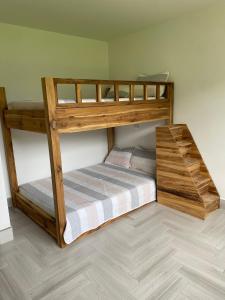 a bedroom with two bunk beds in a room at Beautiful Private Villa, Views in Every Direction in Bolívar