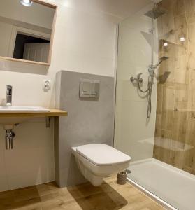 Kúpeľňa v ubytovaní Apartamenty Lobeliowy Port