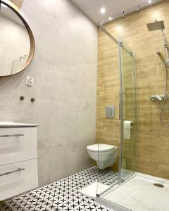 Kúpeľňa v ubytovaní Apartamenty Lobeliowy Port