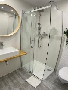 Kúpeľňa v ubytovaní Apartamenty Lobeliowy Port