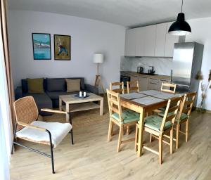 Kuchyňa alebo kuchynka v ubytovaní Apartamenty Lobeliowy Port