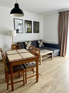Posedenie v ubytovaní Apartamenty Lobeliowy Port