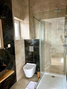 Kúpeľňa v ubytovaní Apartamenty Lobeliowy Port