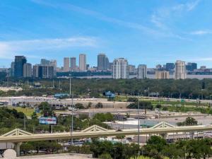 a view of a city with a bridge and buildings at Lavish 2BR Apartment in Tampa in Tampa