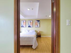 Ένα ή περισσότερα κρεβάτια σε δωμάτιο στο Suite 1 Bedroom with Seaview-Horizons 101