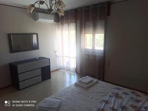 A bed or beds in a room at Villa Iris