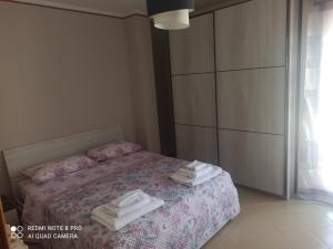 A bed or beds in a room at Villa Iris