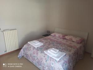 A bed or beds in a room at Villa Iris
