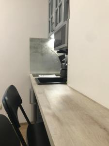 Kuchyňa alebo kuchynka v ubytovaní Deviza Apartments