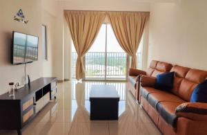 TV a/nebo společenská místnost v ubytování Time Homestay (6-8pax) The Venus, Manjung/Sitiawan