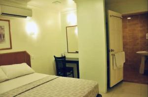 Postelja oz. postelje v sobi nastanitve Hotel Johan