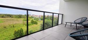 Balkón alebo terasa v ubytovaní Apartament Westin House 312
