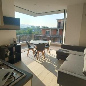 O zonă de relaxare la Recanati Chic Apartament -La Maison de la Madame