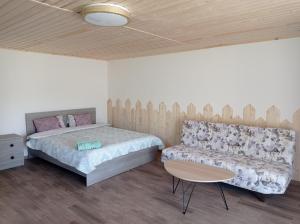 En eller flere senger på et rom på Amrakits Canyon Guest House 1