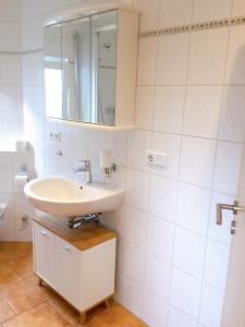Ένα μπάνιο στο Wohnung mit Stil +16 φωτογραφίες